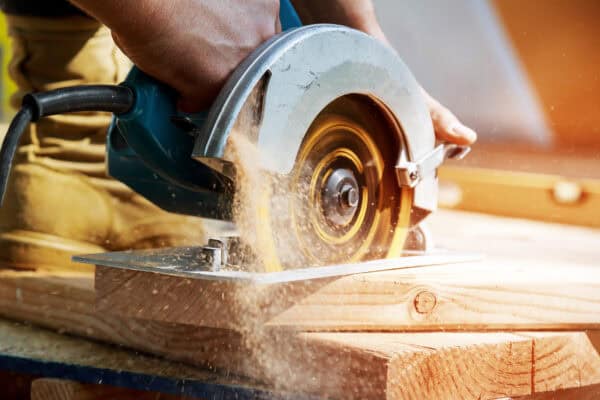 Circular saw being used to cut timber